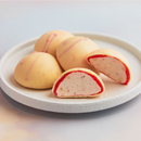 A white colored plate contains four pieces Crunchy Strawberry Cheesecake Mochi Ice Cream - MOISHI