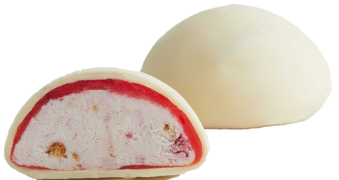 A close up of a piece of MOISHI's Crunchy strawberry cheesecake - A tasty mochi ice cream treat
