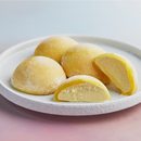 A white plate filled with Vanilla flavored Moishi Ice Cream of MOISHI, Dubai's best mochi ice cream brand.