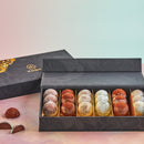 A luxurious box filled with MOISHI mochi truffles on a table - the renowned Japanese confectionery brand in Dubai.